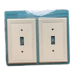 Henne Bery 2 Pack Decorative Single Wall Plate Toggle Light Almond Beaded Border. Fixed Price $13.00.