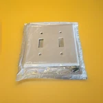 (an) Lot Of 32 Leviton 88009 2-gang White Thermoset Toggle Switch Wall Plate. Fixed Price $36.08.